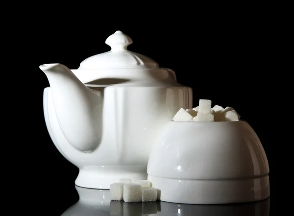 Refined sugar in white sugar bowl on black background — Stock Photo, Image