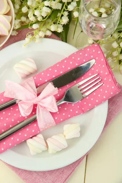 Table setting in white and pink tones on color wooden background — Stock Photo, Image