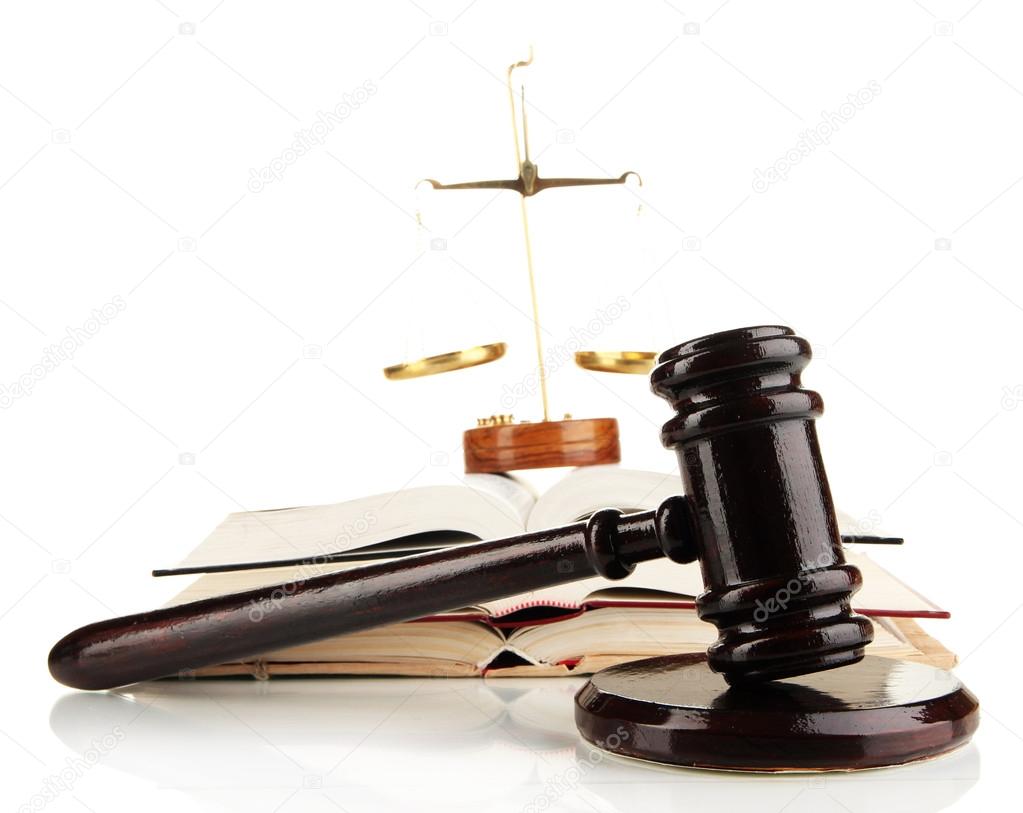 Wooden gavel, golden scales of justice and books isolated on white
