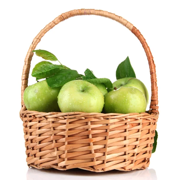 Juicy green apples with leaves in basket, isolated on white — Stock Photo, Image