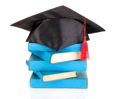 grad şapka ile üzerine beyaz izole kitap