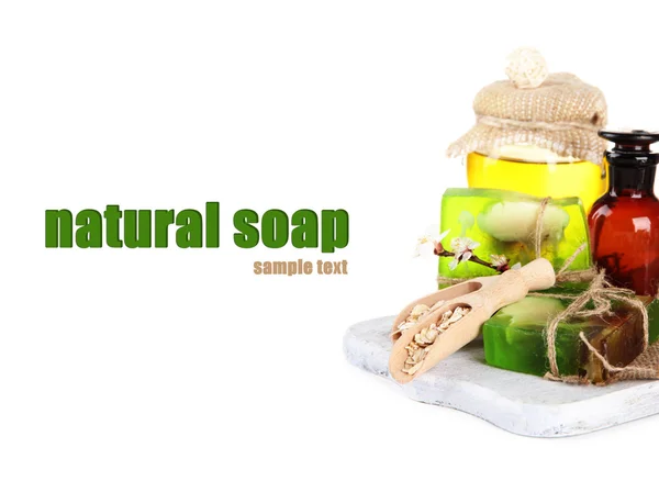 Hand made soap and ingredients for soap making, isolated on white — Stock Photo, Image