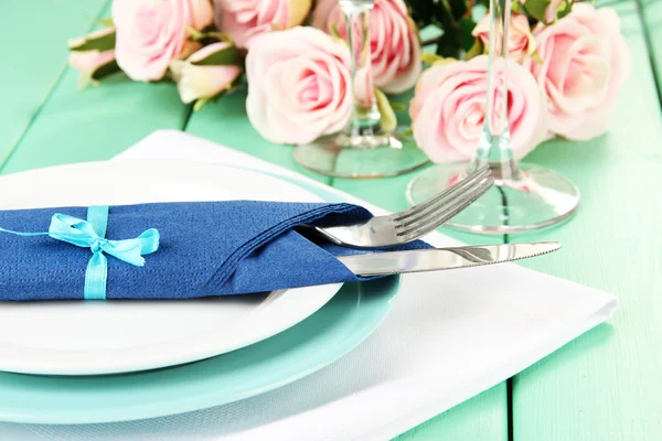 Table serving on a wooden background — Stock Photo, Image