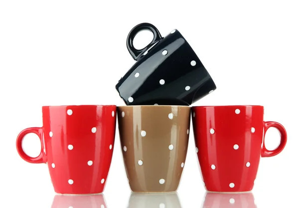 Four cups of polka dot isolated on white — Stock Photo, Image