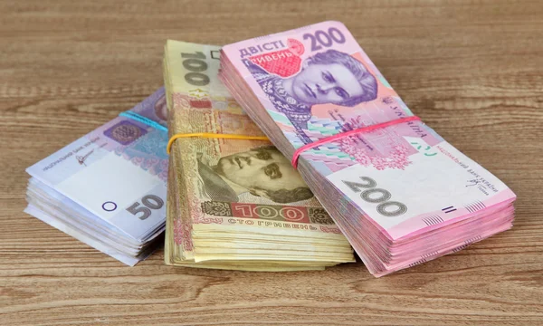 Ukraiński pieniądze na drewniane tła — Zdjęcie stockowe