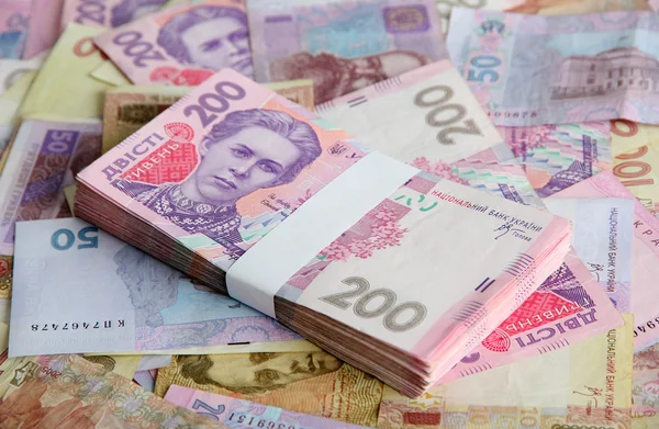 Haufen ukrainischen Geldes — Stockfoto