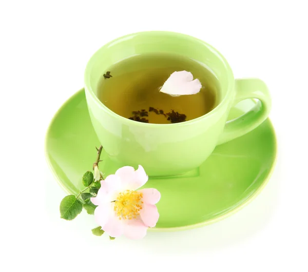 Xícara de chá de ervas com flor de rosa do quadril, isolado em branco — Fotografia de Stock
