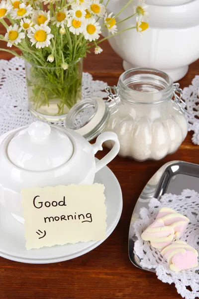 Table setting with chamomiles on wooden table — Stock Photo, Image