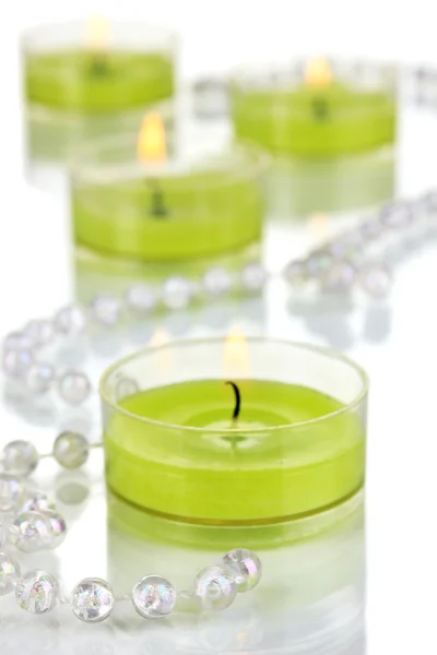 Lighted candles with beads close up — Stock Photo, Image