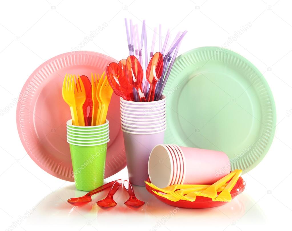 Multicolored plastic tableware isolated on white