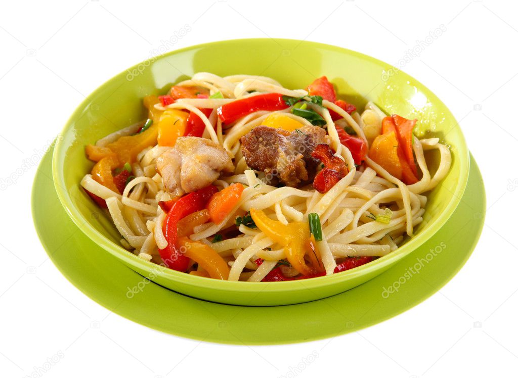 Noodles with vegetables on plate isolated on white