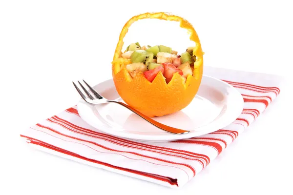 Fruit salad in hollowed-out orange isolated on white — Stock Photo, Image