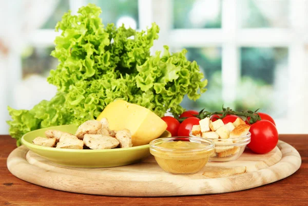 Ingredients for Caesar salad on bright background — Stock Photo, Image