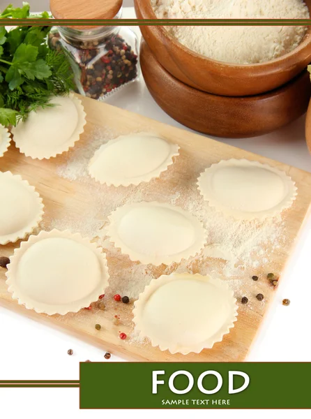 Raw dumplings and ingredients on wooden desk, close up — Stock Photo, Image
