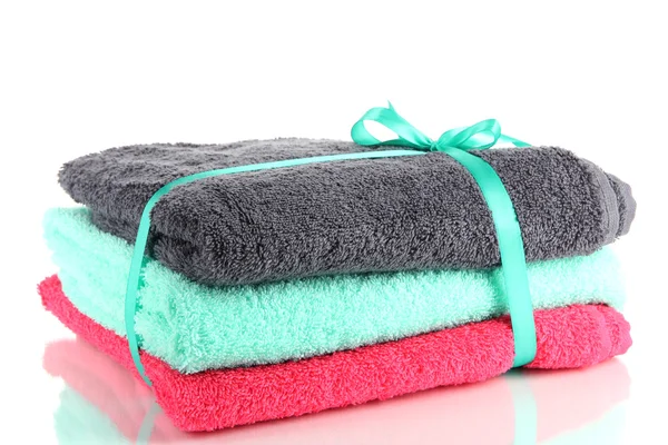 Towels tied with ribbon isolated on white — Stock Photo, Image