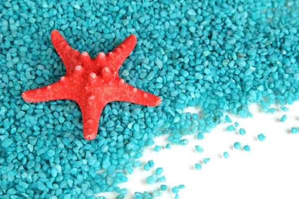 Starfish on blue crystals of sea salt background — Stock Photo, Image