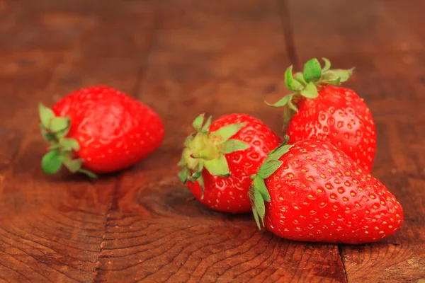 Fresh strawberry on wooden background — Stock Photo, Image