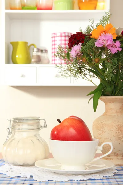 Kitchen composition on table on shelf background — Stock Photo, Image