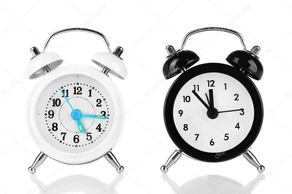 Two old style alarm clocks isolated on white Stock Photo by ©belchonock