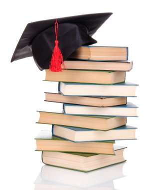 grad şapka ile üzerine beyaz izole kitap
