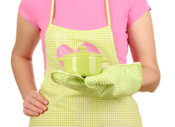 Closeup of homemaker in apron holding pan isolated on white — Stock Photo, Image