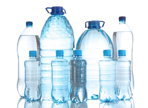 Diferentes botellas de agua aisladas en blanco —  Fotos de Stock