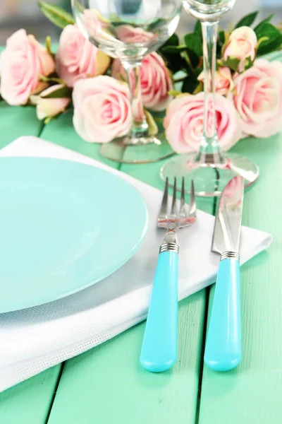 Table serving on a wooden background — Stock Photo, Image