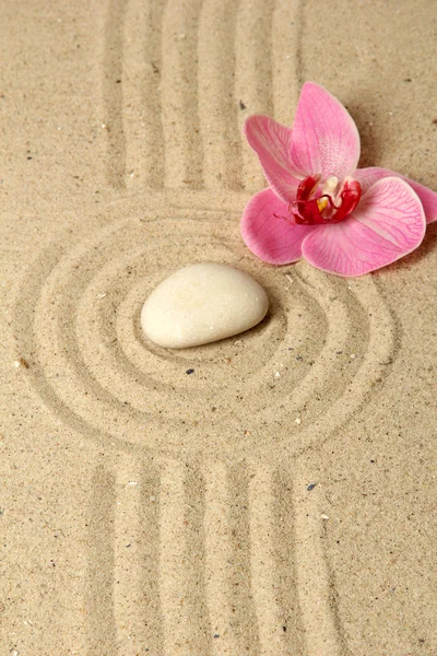 Zen garden with raked sand and round stone close up — Stock Photo, Image