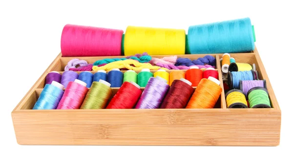 Colorful threads for needlework in wooden box isolated on white — Stock Photo, Image