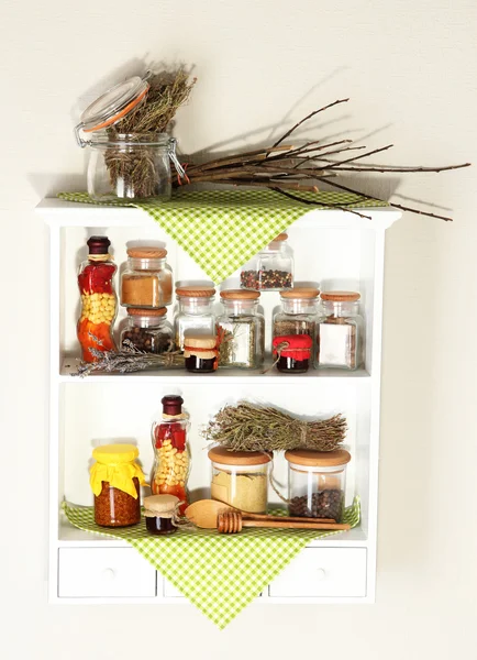 Variety spices on kitchen shelves — Stock Photo, Image