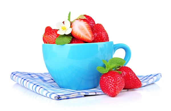 Ripe sweet strawberries in blue cup, isolated on white — Stock Photo, Image