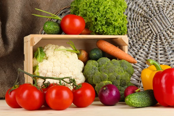 Fresh vegetables in wooden box on table close up — Stock Photo, Image