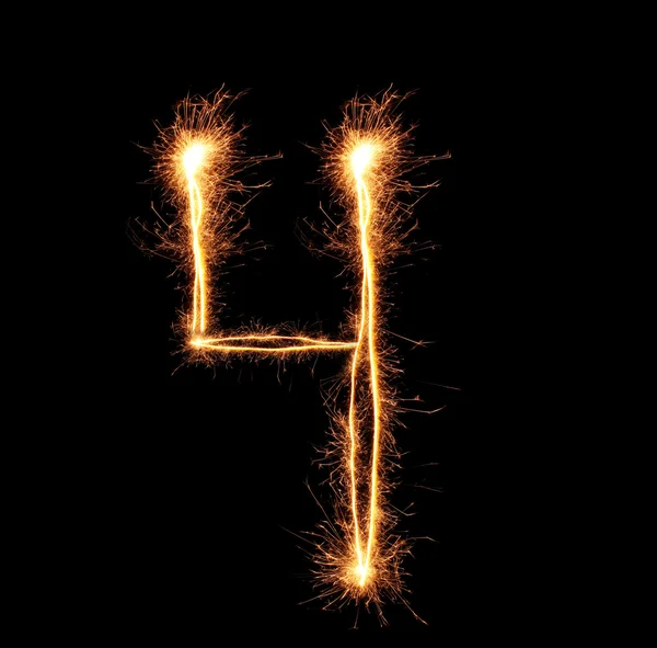 Number "four" sparklers on black background — Stock Photo, Image