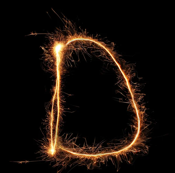 Letter "D" sparklers on black background — Stock Photo, Image