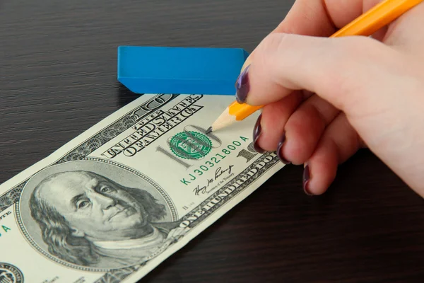 Making fake dollar on wooden background — Stock Photo, Image