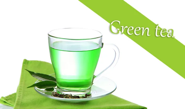 Tasse transparente de thé vert sur serviette, isolée sur blanc — Photo