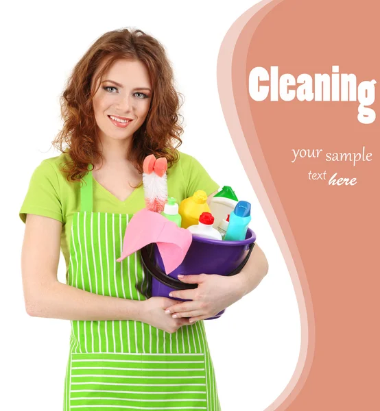 Female cleaner holding bucket with cleaning supplies isolated on white — Stock Photo, Image