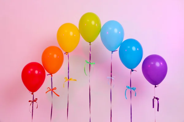 Rainbow of balloons on light background — Stock Photo, Image