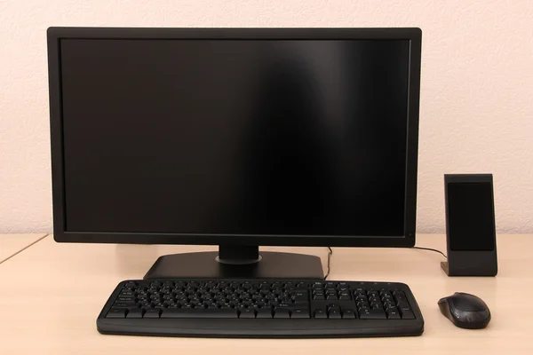 Computer on table in room — Stock Photo, Image