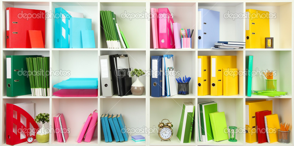 White office shelves with different stationery, close up ⬇ Stock Photo