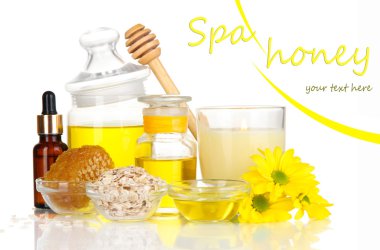 yağlar ve üzerinde beyaz izole bal kokulu bal spa