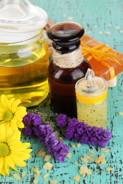 Fragrant honey spa with oils and honey on wooden table close-up — Stock Photo, Image