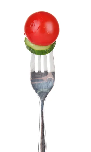 Cherry tomato and cucumber slice sticking on fork, isolated on white — Stock Photo, Image