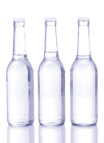 Пляшки води ізольовані на білому — стокове фото