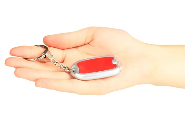 Sleutelhanger in hand geïsoleerd op wit — Stockfoto