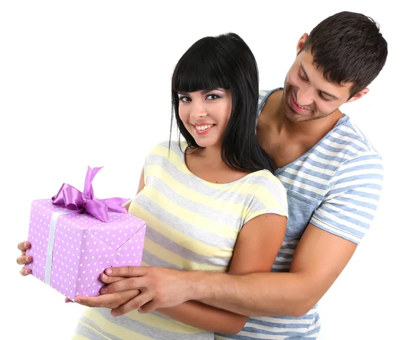 Beautiful loving couple with gift isolated on white — Stock Photo, Image