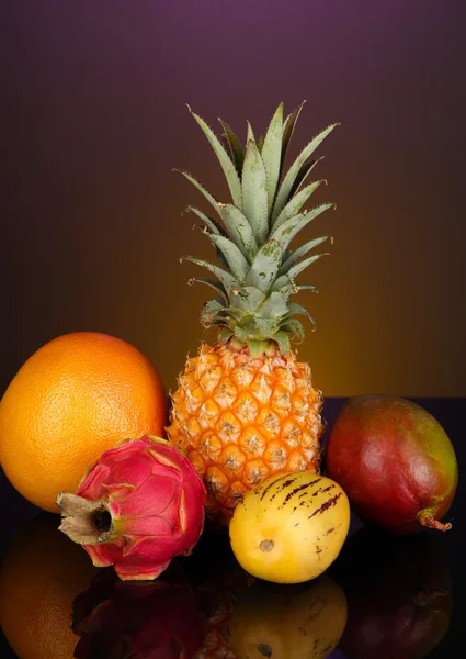 Composition of exotic fruits on colorful background — Stock Photo, Image