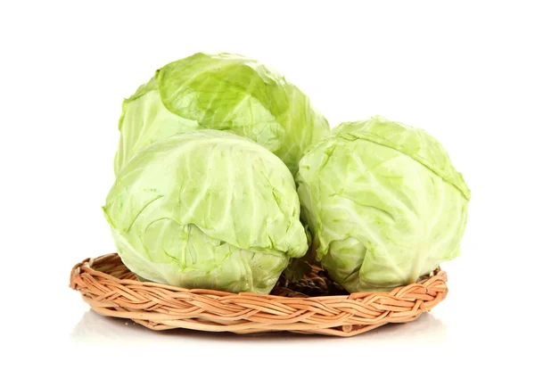 Green cabbage on wicker mat, isolated on white — Stock Photo, Image