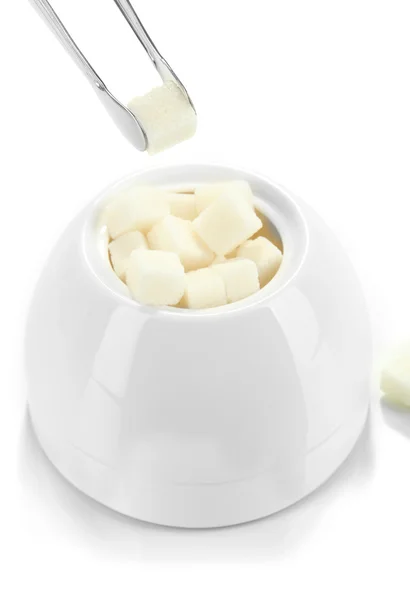 Refined sugar in white sugar bowl on grey background — Stock Photo, Image