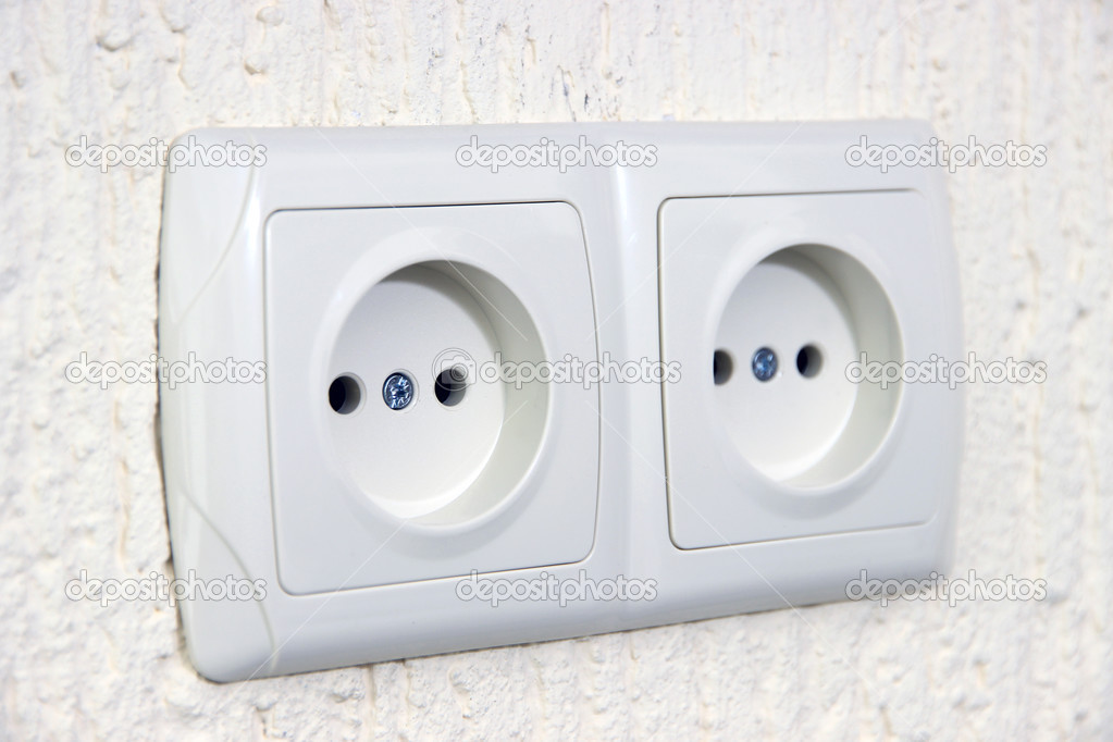 Two sockets on wall